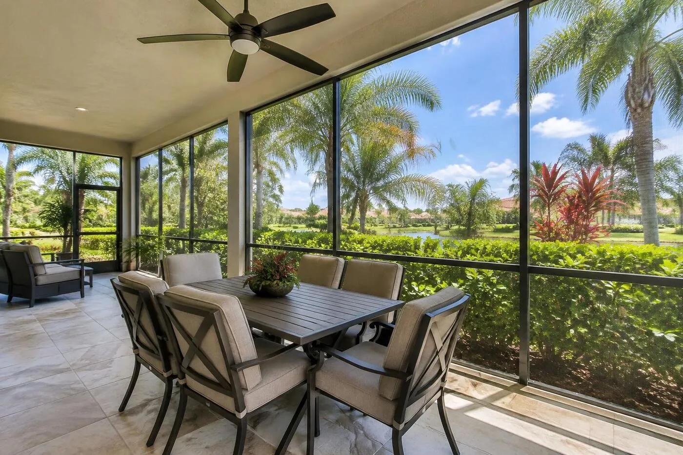 Screened lanai enclosure with outdoor dining in Port Charlotte, FL